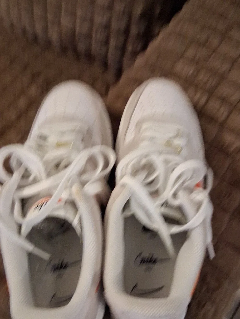 Nike White and Beige Low-Top Sneakers with Black Swoosh